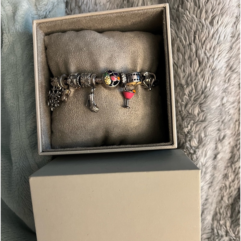 Pandora Bracelet with 15 charms all from Reeds